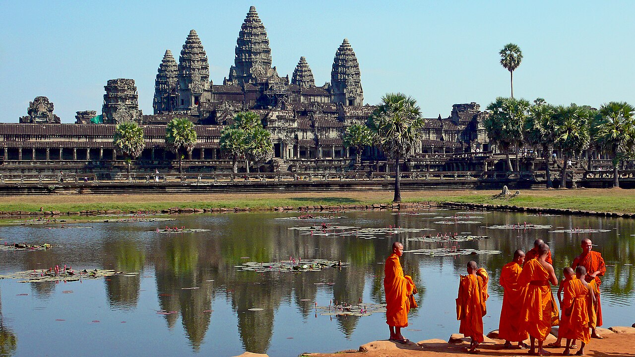 Angkor Wat temple complex in Cambodia with monks in the foreground